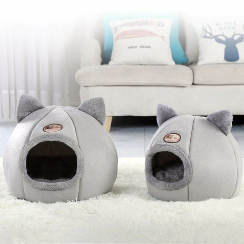 Cama acogedora 2 en 1 para mascotas con forma de casita.